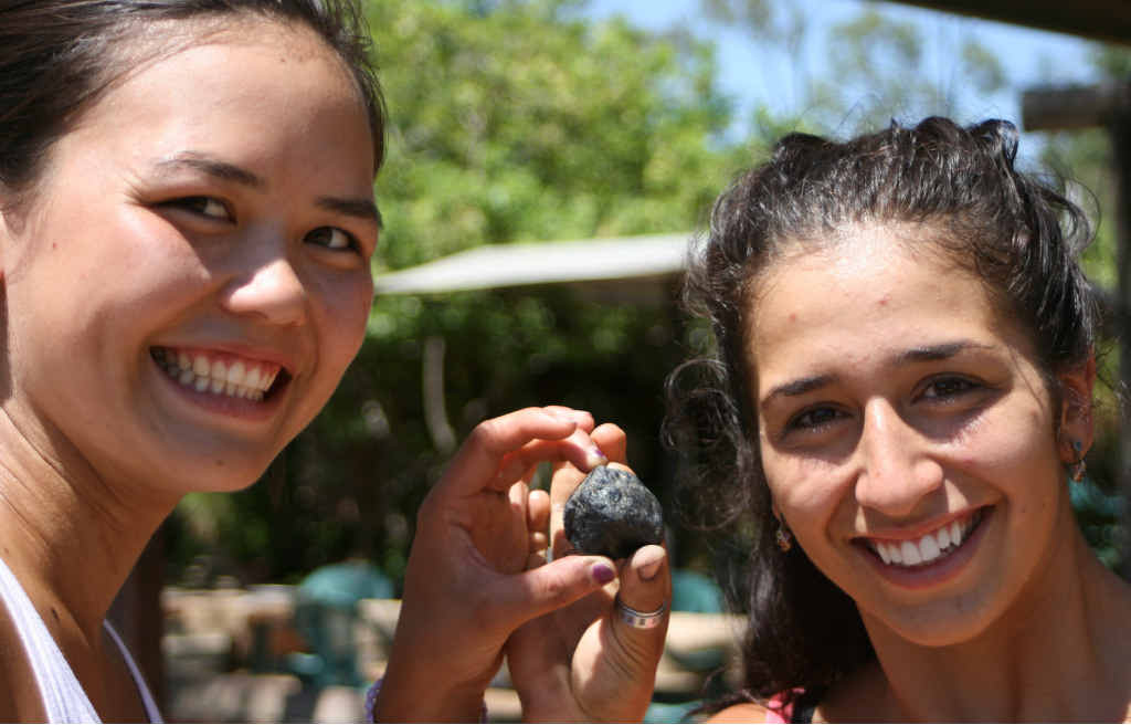 LUCKY FIND: Canadian backpackers Jenny and Fianata check out the extraordinary sapphire found in the Central Highlands Gemfields last week. LUCKY FIND: Canadian backpackers Jenny and Fianata check out the extraordinary sapphire found in the Central Highlands Gemfields last week.